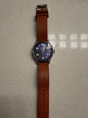 Nixon Blue Dial Watch with Brown Leather Strap